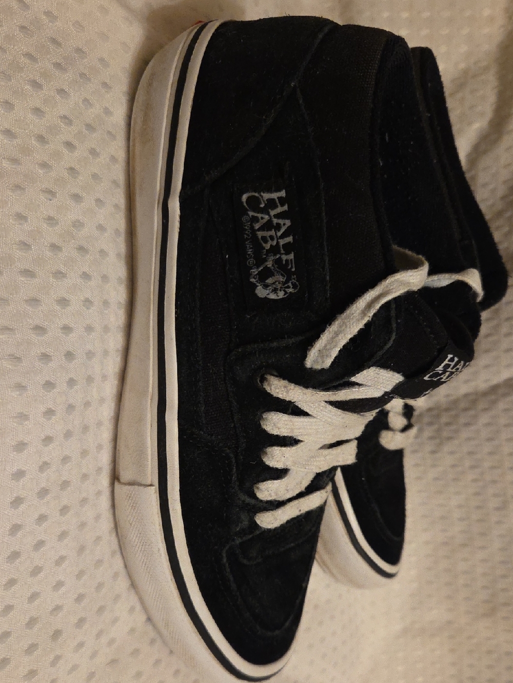 Vans Black Skate Shoe with White Trim and Red Pro Tab